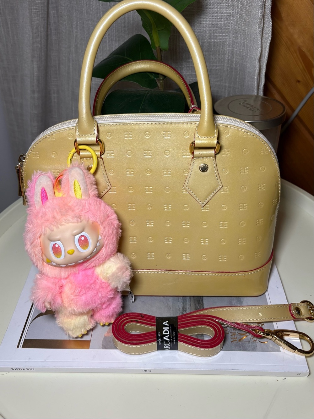 Arcadia Italian patent leather satchel featuring a structured ( No labubu)